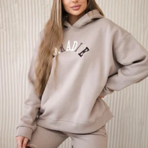 Medvilninis su išsiuvinėtu užrašu Paradise šviesiai tamsiai smėlio