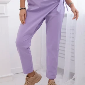 Kelnės, surištos asimetrišku priekiu šviesiai