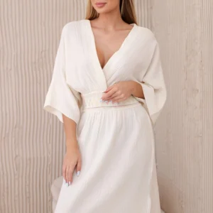 Muslino suknelė su siuvinėjimais ties juosmeniu šviesiai smėlio