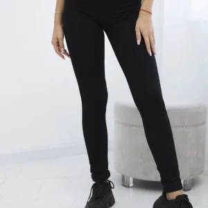 Kelnės su apvadais ant kišenės