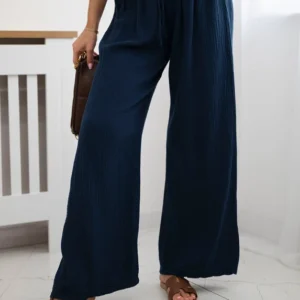 Muslino kelnės su plačia klešne Tamsiai