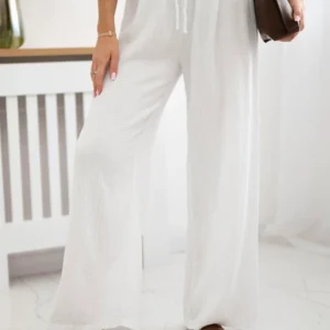 Muslino kelnės su plačia klešne