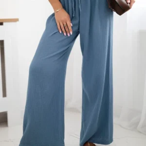 Muslino kelnės su plačia klešne