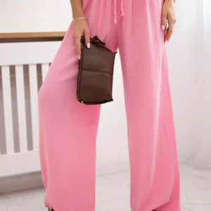 Muslino kelnės su plačia klešne šviesiai