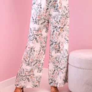 Moteriškos plačios kelnės su gėlių atspaudu tamsios