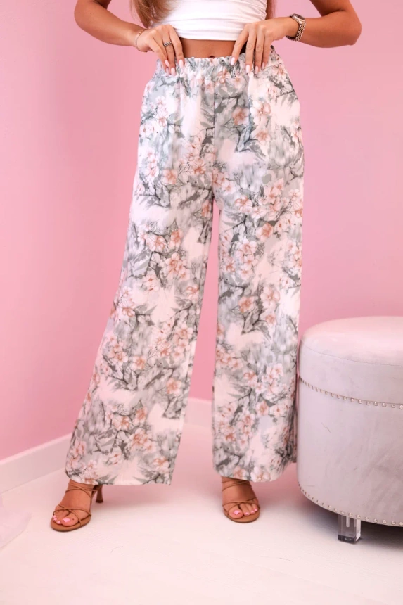 31566_2 Moteriškos plačios kelnės su gėlių atspaudu tamsios