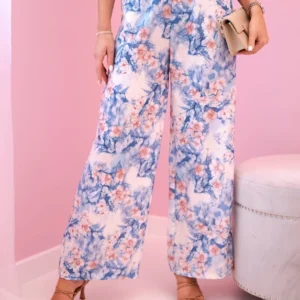 Moteriškos plačios kelnės su gėlių atspaudu