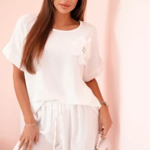 Moteriškas iš viskozės su dekoratyviniu gėlių raštu ir platėjančiomis kelnėmis