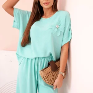 Moteriškas iš viskozės su dekoratyviniu gėlių raštu ir platėjančiomis kelnėmis