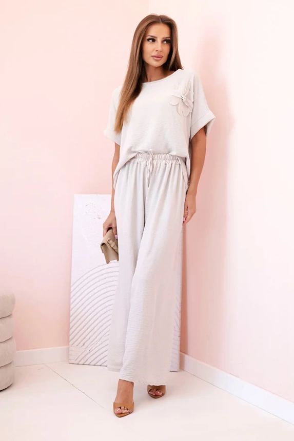 33154_1 Moteriškas iš viskozės su dekoratyviniu gėlių raštu ir platėjančiomis kelnėmis tamsiai smėlio - Image 2