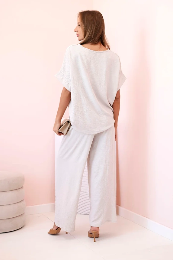 33154_2 Moteriškas iš viskozės su dekoratyviniu gėlių raštu ir platėjančiomis kelnėmis tamsiai smėlio - Image 3