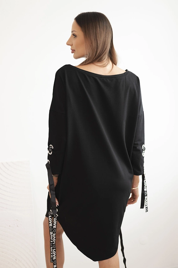 35151_4 Moteriška asimetrinė suknelė su dekoratyvinėmis juostelėmis ir 3/4 rankovėmis - Image 4