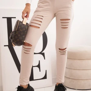 Moteriškos medvilninės kelnės su įtrūkimais ir gumyte juosmenyje bežinės