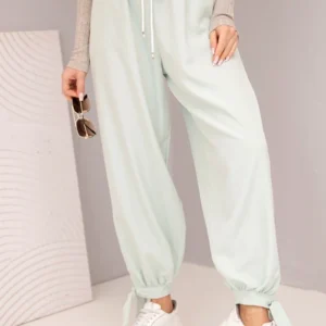 Moteriškos kelnės su plačia kojine ir raišteliu apačioje tamsiai