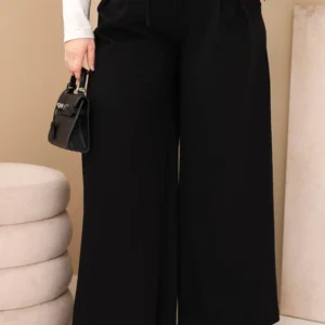 Moteriškos Plus Size kelnės su plačiomis kojomis ir dekoratyvine gėle liemenyje