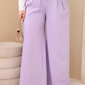 Moteriškos Plus Size kelnės su plačiais klešniais ir dekoratyvine gėle juosmenyje