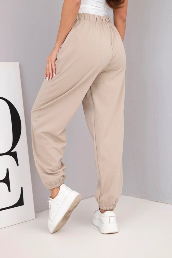 37912_2 Moteriškos medvilninės kelnės su aukštu liemeniu ir dekoratyviniu mygtuku bežinės - Image 3