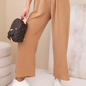 Kelnės su plačiais klešniais smėlio