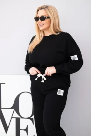 Moteriškas Plus Size su laisvu džemperiu ir plačiomis kelnėmis