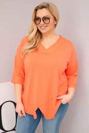 Moteriška medvilninė bluzonė Plus Size su giliu V formos iškirpimu ir asimetriniu apdailos kraštu persikų
