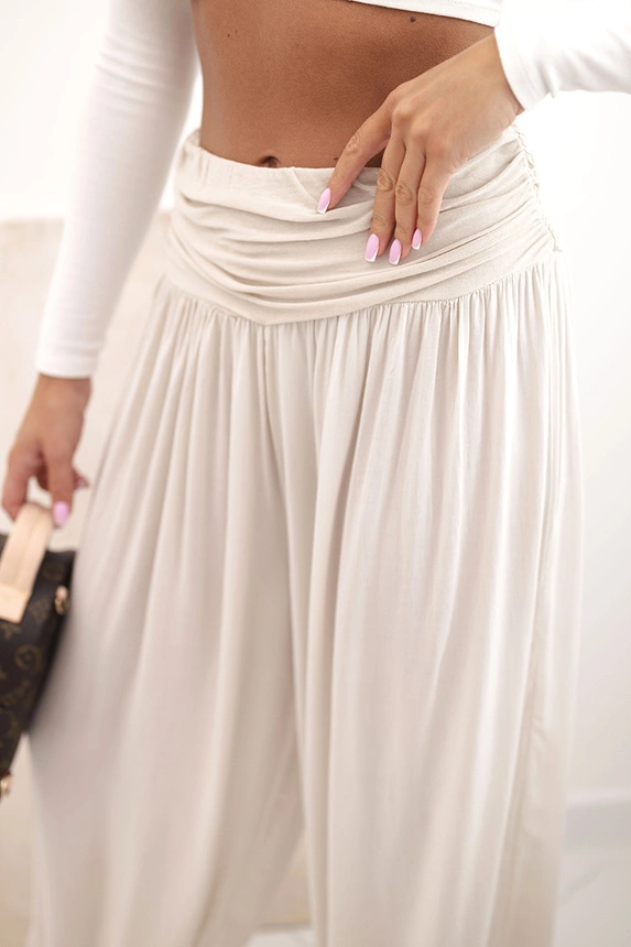 38192_4 Moteriškos viskozės kelnės su plačiomis kojomis ir raukiniais smėlio - Image 4