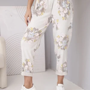 Moteriškos vizoninės kelnės su gėlių raštu ir diržu bežinės